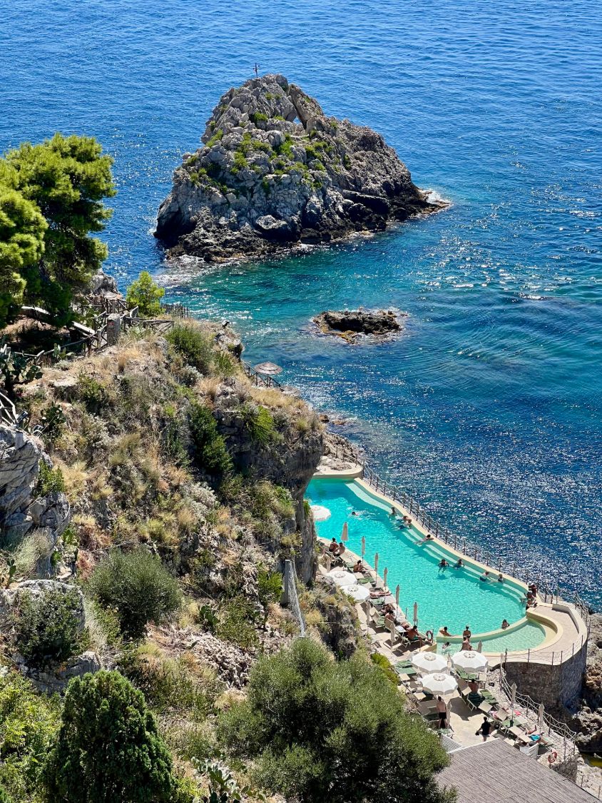 The Signature Story — clifftop infinity pool Mediterranean